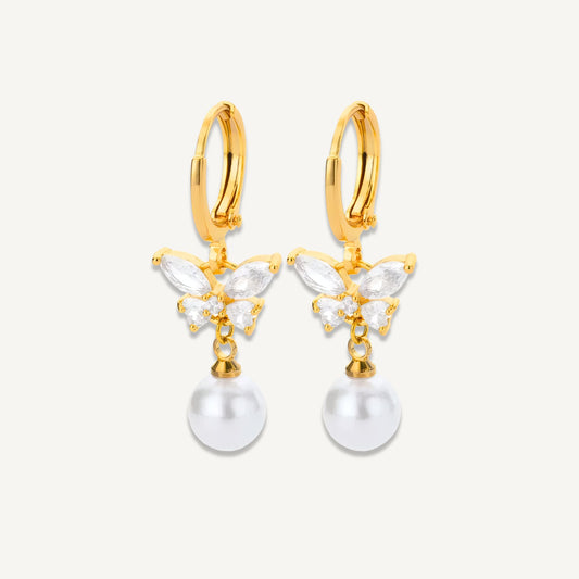 Gold-plated Celeste Butterfly Pearl Drop Earrings with zircon detail shown in a white background